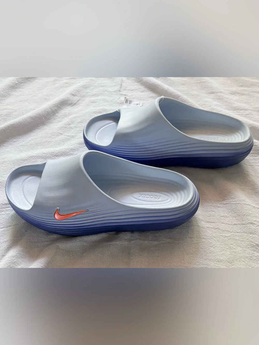 Nike ReactX Rejuven8 Men’s Slides Hydrogen Blue/Blue Crystal/Lapis/Orange sz 11